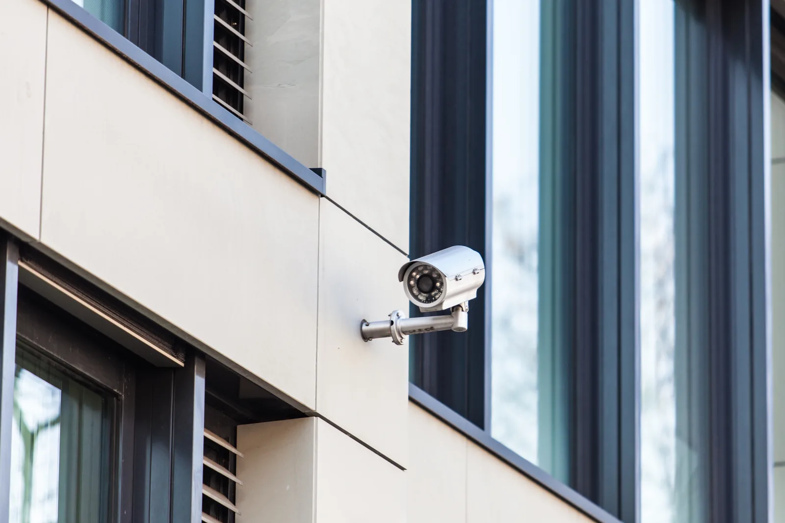 Security camera on a modern building facade